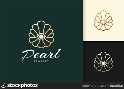 Luxury and high end pearl logo in shell shape represent jewel or classy