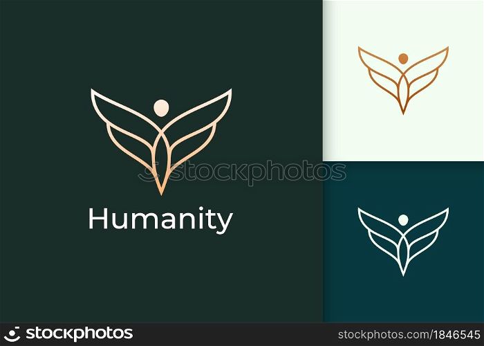 Luxury freedom logo in human and wing represent humanity or peace