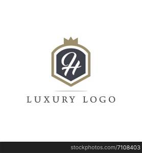 Luxury letter H monogram vector logo design. H letter in shield logo illustration. Safety and security icon.
