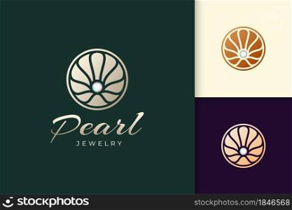 Luxury pearl logo in abstract and circle shape represent jewelry or beauty