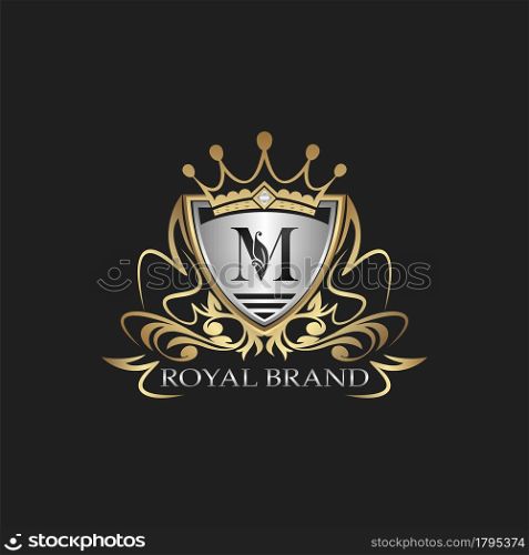 M Letter Gold Shield Logo. Elegant vector logo badge template with alphabet letter on shield frame ornate vector design.
