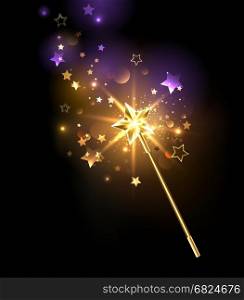 magic wand decorated with gold stars on a black background