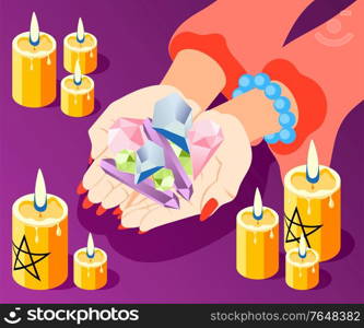 Magical services isometric composition with hands of fortune teller holding bunch of stones with burning candles vector illustration