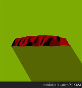 Majestic Uluru icon in flat style on a green background . Majestic Uluru icon, flat style