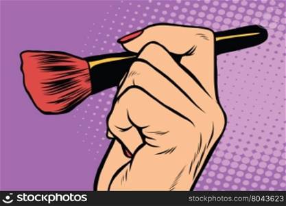 Make-up brush in hand pop art retro vector. Beauty, cosmetics and skin care face