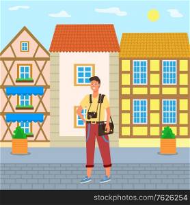 Male photographer standing in front of building facades. Tourist with camera exploring city and taking photos of architecture vector illustration. Flat cartoon. Young Male Photographer and House Facades Vector