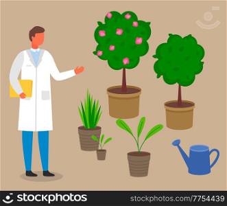 Male scientist, botanist studies and analyzes the plant. Cultivation and processing of plant. Laboratory worker man in a scientist uniform studying different vegetation rules for care and watering. Male scientist, botanist studies and analyzes the plant. Cultivation and processing of plant