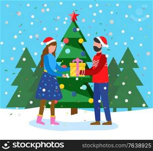 Man and woman holding gift box and standing near fir-tree. Greeting winter holiday postcard with snowy tree and couple in Santa hat. Festive card people with present near traditional Xmas wood vector. Winter Holiday Card Couple with Present Vector
