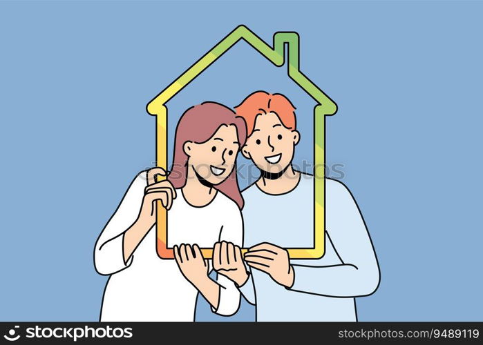 Man and woman with house outline symbolizing family property and sustainable energy efficient housing. Young couple recommends taking out mortgage or insuring house to avoid possible problems. Man and woman with house outline symbolizing family property and energy efficient housing