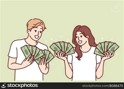 Man and woman with lot of cash in hands brag about money they earned from business or winning jackpot in lottery. Couple rich guys girls with money want to invest savings or invest in startup . Man and woman with cash in hands brag about money they earned from business or winning jackpot
