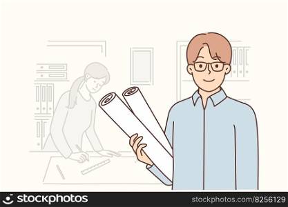 Man architect stands in office of construction company with drawings in hands to advertise architectural services. Guy and girl work in architectural bureau developing projects for new buildings. Man architect stands in office with drawings in hands to advertise construction services