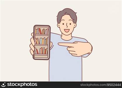Man demonstrates online library on phone and points finger at display recommending downloading apps with books. Guy student offers to visit online bookstore or install web library application. Man demonstrates online library with books on phone and points finger at display