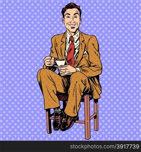 Man drinking tea sitting on the stool. Man he sits smiling childishly, putting his feet on the step