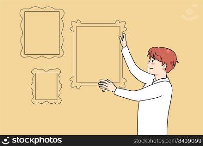 Man hanging frames with family pictures on wall. Happy male putting portrait for memory. Nostalgia concept. Home decoration. Vector illustration.. Man hanging frames on wall