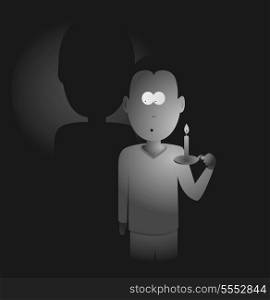 Man holding a candle in the darkness
