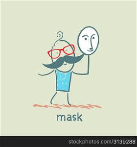 man holding a mask