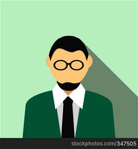 Man in glasses with a beard in a green suit icon in flat style on a light blue background. Man in glasses with a beard in a green suit icon