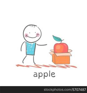 man opens a box with an apple