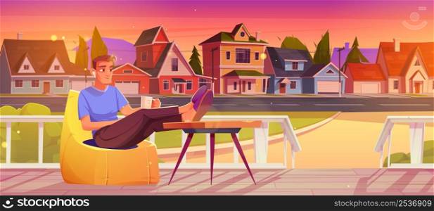 Man rest on wooden house porch in suburban street. Vector cartoon illustration of person sitting in bean bag chair with cup and earbuds on terrace and view of cottages at sunset. Man rest on wooden house porch in suburban street