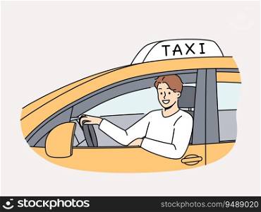 Man sits behind wheel of TAXI car and looks out window making career as public transport driver. Positive young guy TAXI driver looks at screen offering to get home quickly and safely. Man sits behind wheel of TAXI car and looks out window making career as public transport driver