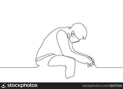 man sits in mask with his elbows on his knees, back is bent, head is down, hands are relaxed. one line drawing a person is tired, tense, empty, frustrated or depressed