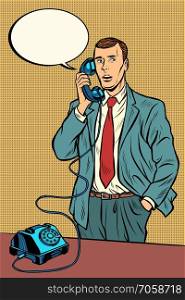 man talking on a retro phone. Pop art retro vector illustration vintage kitsch. man talking on a retro phone