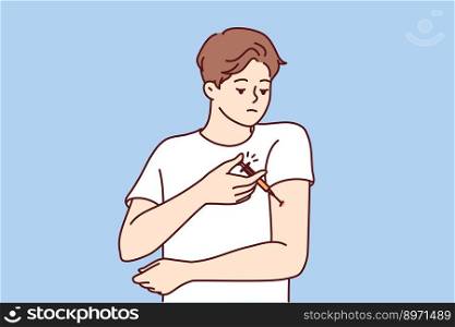 Man with diabetes makes injection in arm to lower blood sugar and avoid insulin shock. Guy is experiencing problems and need for regular injections after suffering from diabetes or infectious flu. Man with diabetes makes injection in arm to lower blood sugar and avoid insulin shock