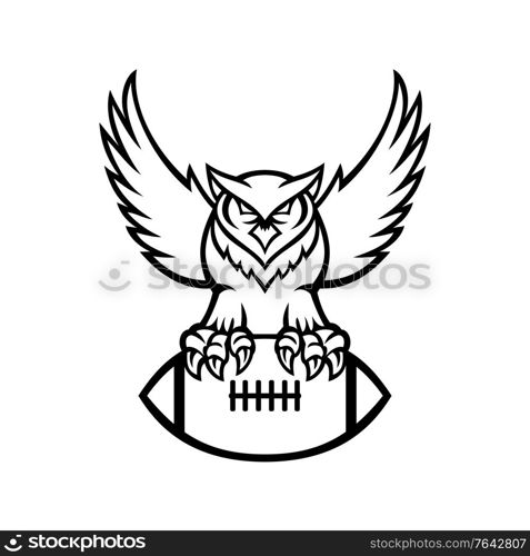 Mascot illustration of a great horned owl, tiger owl or hoot owl, a large owl native to the Americas, clutching an American football ball viewed from front in retro black and white style.. Great Horned Owl or Tiger Owl Clutching American Football Ball Mascot Black and White