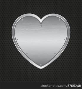 Metallic heart on a perforated metal background
