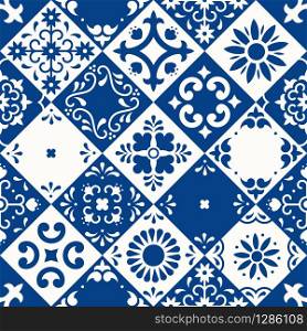 Mexican talavera seamless pattern. Ceramic tiles with flower, leaves and bird ornaments in traditional majolica style from Puebla. Mexico floral mosaic in classic blue and white. Folk art design. Mexican talavera seamless pattern. Ceramic tiles with flower, leaves and bird ornaments in traditional majolica style from Puebla. Mexico floral mosaic in classic blue and white. Folk art design.