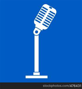 Microphone icon white isolated on blue background vector illustration. Microphone icon white