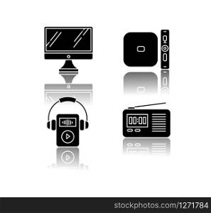 Mobile devices drop shadow black glyph icons set. Pocket electronic gadgets. Smart technology. Desktop computer, MP3 music player. Radio set, media player. Isolated vector illustrations on white space
