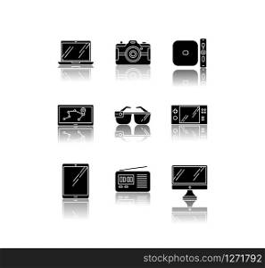 Mobile devices drop shadow black glyph icons set. Pocket electronic gadgets. Smart technology. Tablet, laptop, computer. Navigator, smartglasses, radio set. Isolated vector illustration on white space