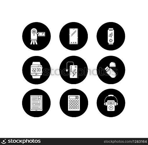 Mobile devices glyph icons set. Pocket electronic gadgets. Powerbank, smartphone, video camera. Flash drive, calculator. Compact digital tools. Vector white silhouettes illustrations in black circles