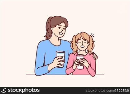 Mom and daughter drink natural milk to get useful vitamins and lactose or calcium from eco product. Woman hugging smiling teenage girl drinking milk to promote healthy food without chemicals. Mom and daughter drink natural milk to get useful vitamins and lactose or calcium from eco product