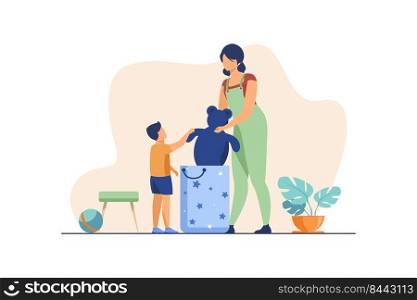 Mom and little son packing toys in bag. Teddy bear, donation, home interior flat vector illustration. Charity, childhood, toy sharing concept for banner, website design or landing web page