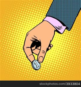 Monetary contribution. The hand holds a coin. Business concept. Accumulation alms charity pop art retro style. Monetary contribution. The hand holds a coin. Business concept