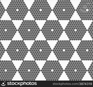 Monochrome abstract geometrical pattern. Modern gray seamless background. Flat simple design.Gray small hexagons forming hexagons.