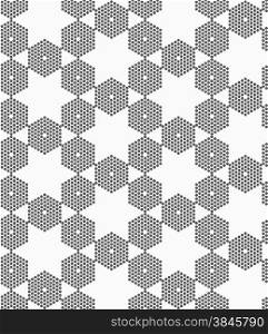 Monochrome dotted texture. Abstract seamless pattern. Ornament made of dots.Textured with hexagons hexagonal grid.
