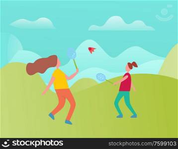 Mother and daughter playing badminton outdoors. Family sport. Mother and Daughter Playing Badminton