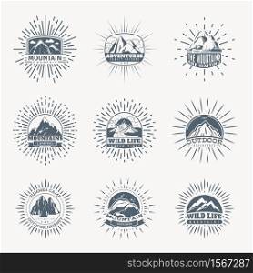 Mountain emblems. Mountains set of monochrome vintage badges, mountaineering camp and adventure tourism, hiking and trekking expedition retro labels retro vector logo isolated silhouette collection. Mountain emblems. Mountains set of monochrome vintage badges, mountaineering camp and adventure tourism, hiking expedition retro labels retro vector logo isolated silhouette collection