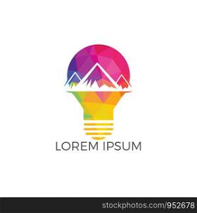 Mountain inside light logo design. Leadership solution logbulb o design. Concept of lamp, brainstorm, tourism, mission, strategy, ray, victory, briefing.