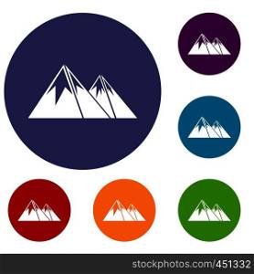 Mountains with snow icons set in flat circle reb, blue and green color for web. Mountains with snow icons set