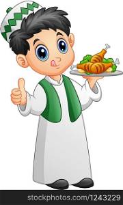 Muslim kid holding a platter of chicken meat and giving thumb up