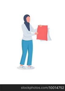 Muslim woman doing laundry flat color vector faceless character. Drying pillows. Housekeeping, home chores. Spring cleaning isolated cartoon illustration for web graphic design and animation. Muslim woman doing laundry flat color vector faceless character