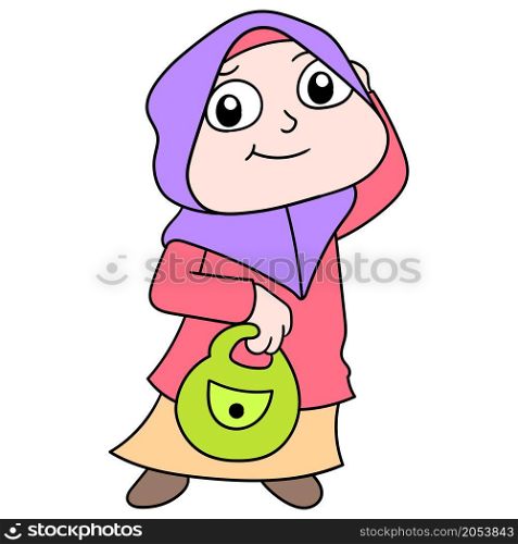 muslim woman wearing a hijab carrying a shopping bag
