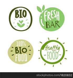Natural products logo stickers. Organic fresh food labels with text and leaves. Eco and bio circle hand drawn packaging tags, green healthy round badges, vegetarian pure emblem, vector isolated set. Natural products logo stickers. Organic fresh food labels with text and leaves. Eco and bio circle hand drawn packaging tags, green healthy round badges, vegetarian pure emblem vector set