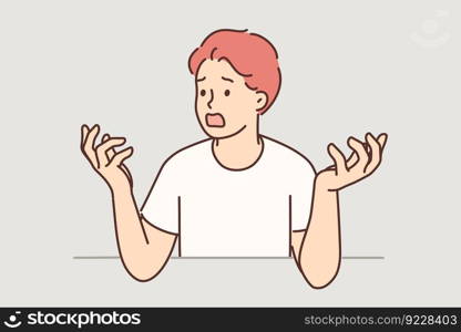 Nervous man throws up hands and opens mouth wide screaming and swearing after being disappointed by bad news. Shocked guy is frustrated with problems that have arisen and feels emotional stress. Nervous man throws up hands and opens mouth wide screaming and swearing having heard bad news