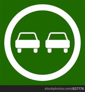 No overtaking road traffic sign icon white isolated on green background. Vector illustration. No overtaking road traffic sign icon green