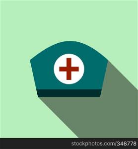Nurse cap icon in flat style on a light blue background. Nurse cap icon, flat style